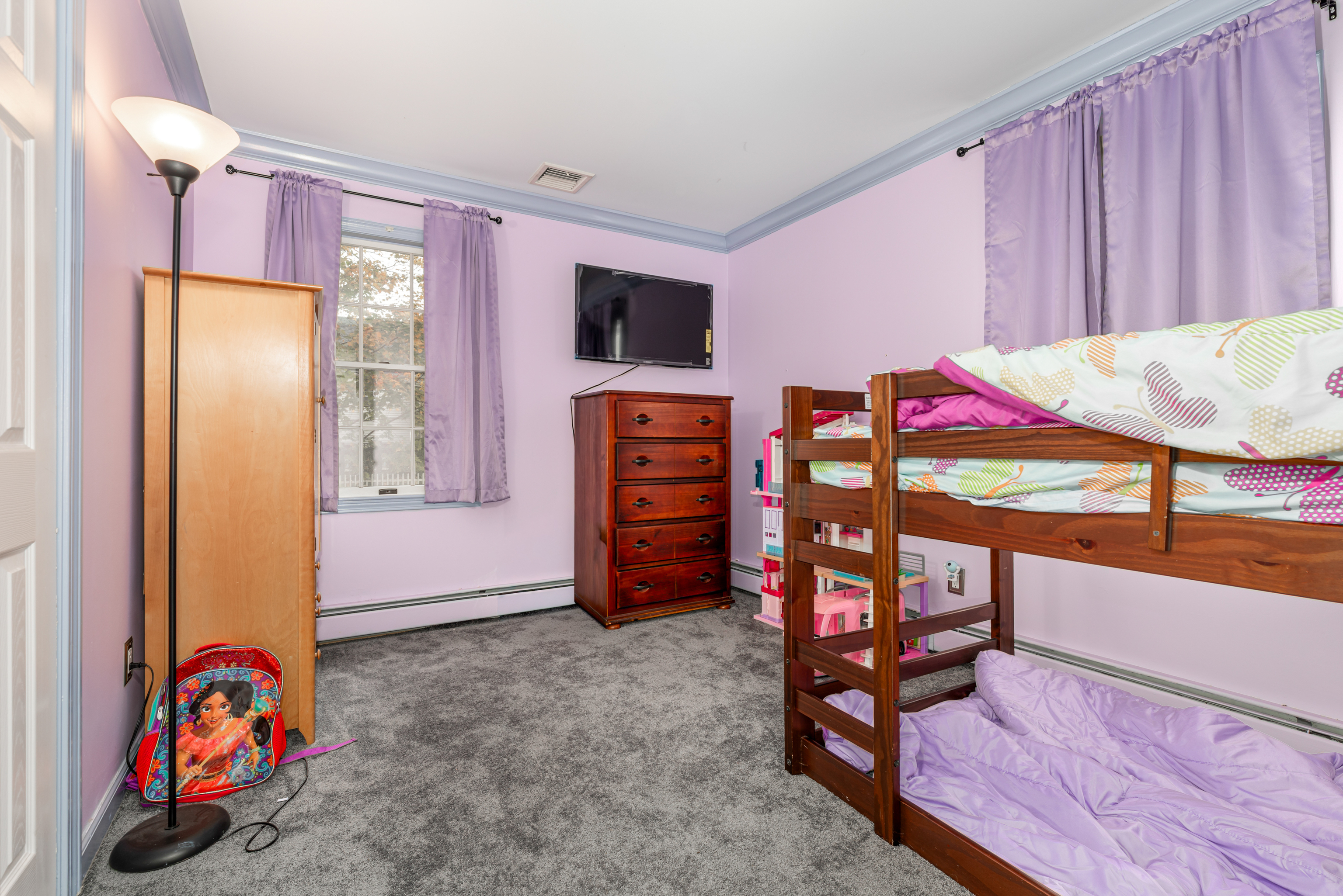 224 Roses Mill Road Milford, CT 06460 - Photo 16 of 30 a view of a bedroom with furniture and window