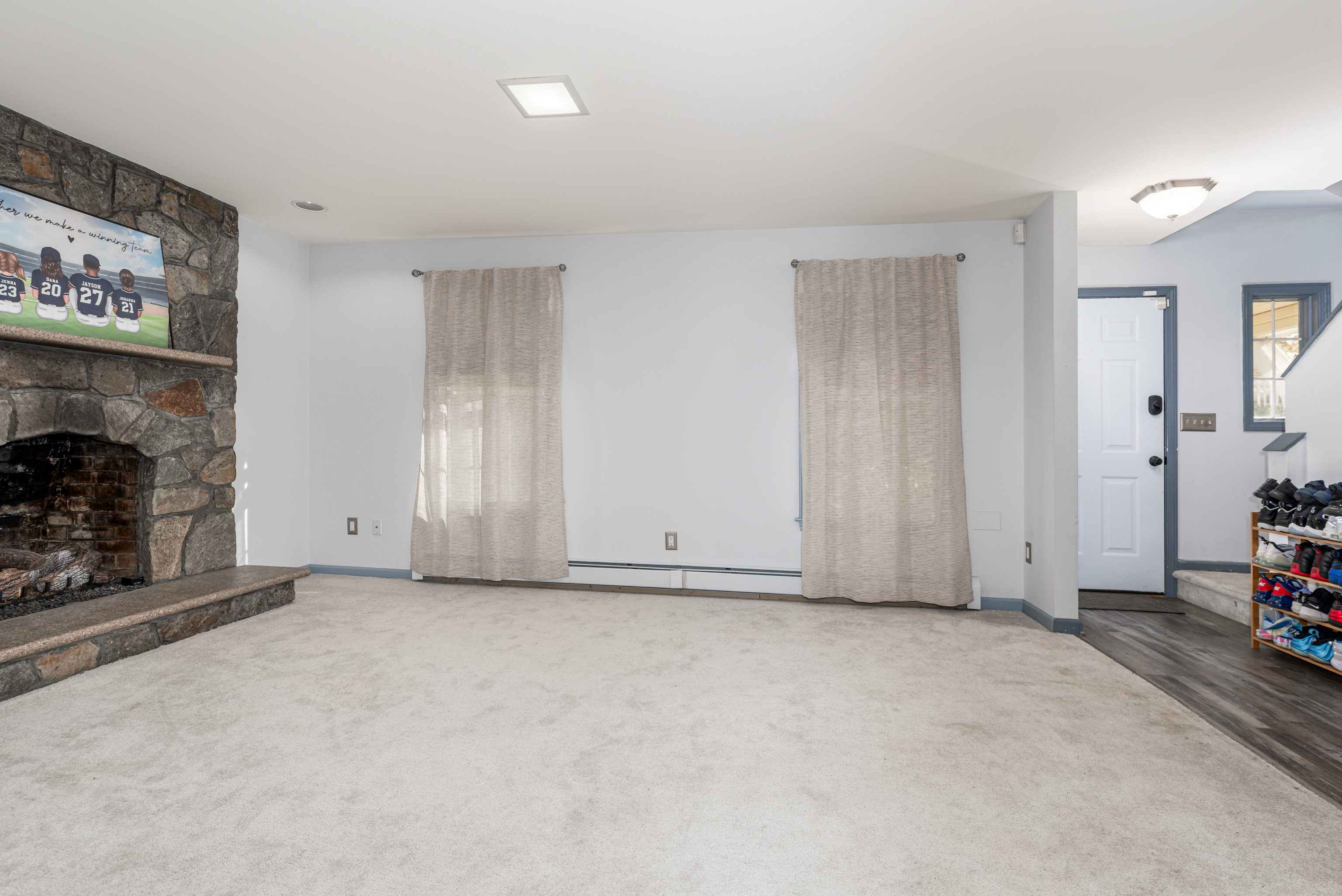 224 Roses Mill Road Milford, CT 06460 - Photo 19 of 30 a view of an empty room with fire place