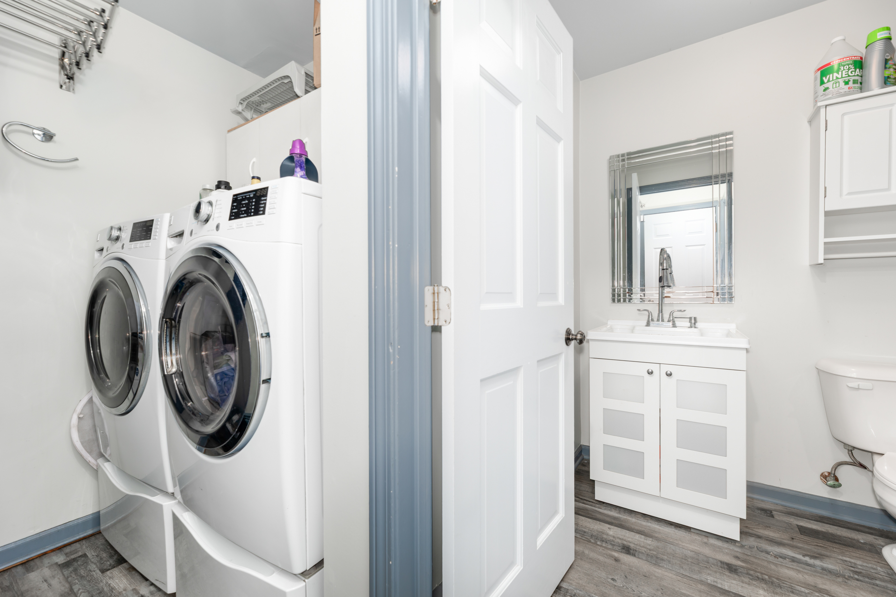224 Roses Mill Road Milford, CT 06460 - Photo 22 of 30 a utility room with sink dryer and washer