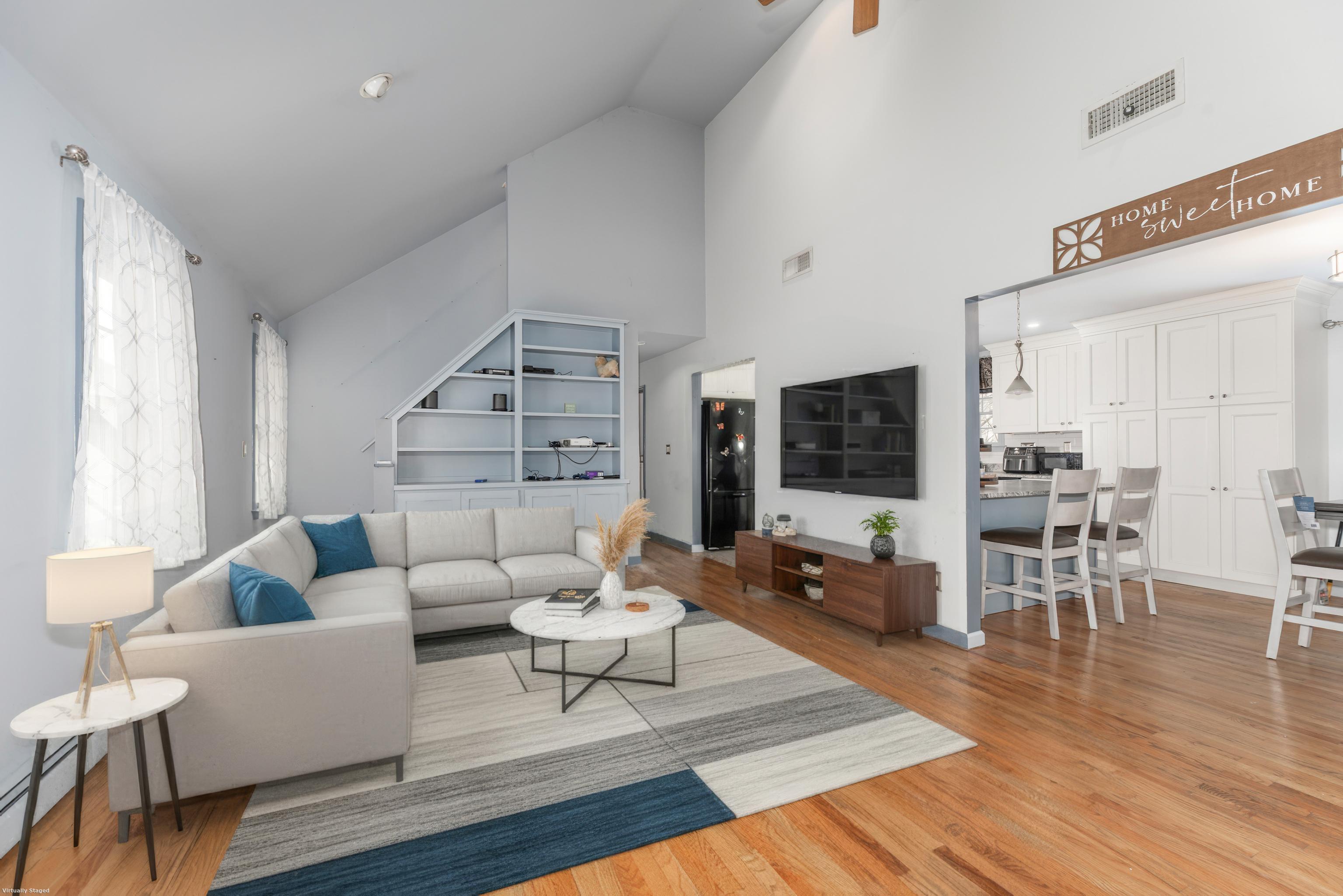 224 Roses Mill Road Milford, CT 06460 - Photo 7 of 30 a living room with furniture and a wooden floor