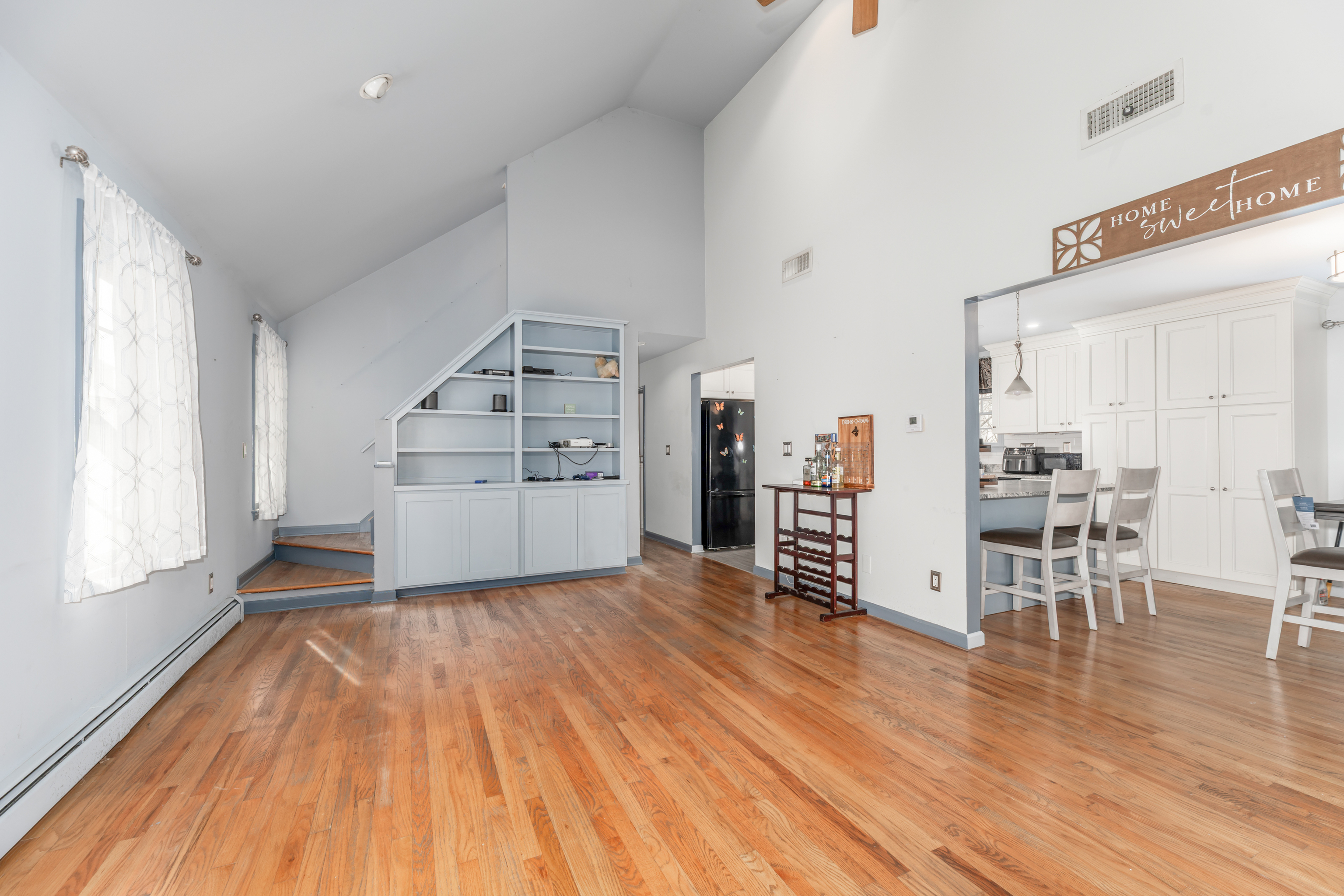 224 Roses Mill Road Milford, CT 06460 - Photo 8 of 30 a view of a kitchen with furniture and wooden floor