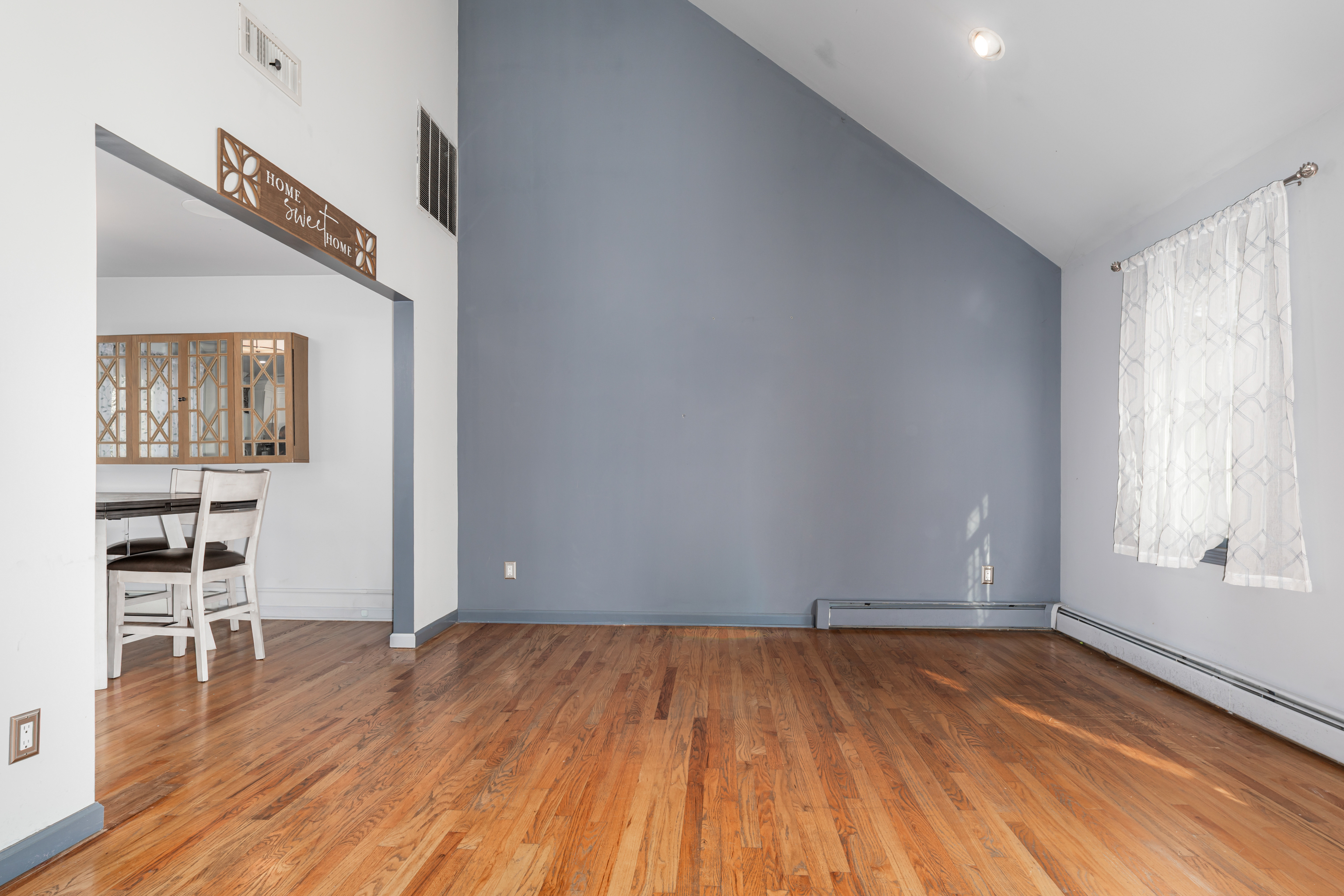 224 Roses Mill Road Milford, CT 06460 - Photo 10 of 30 wooden floor in an empty room with a window