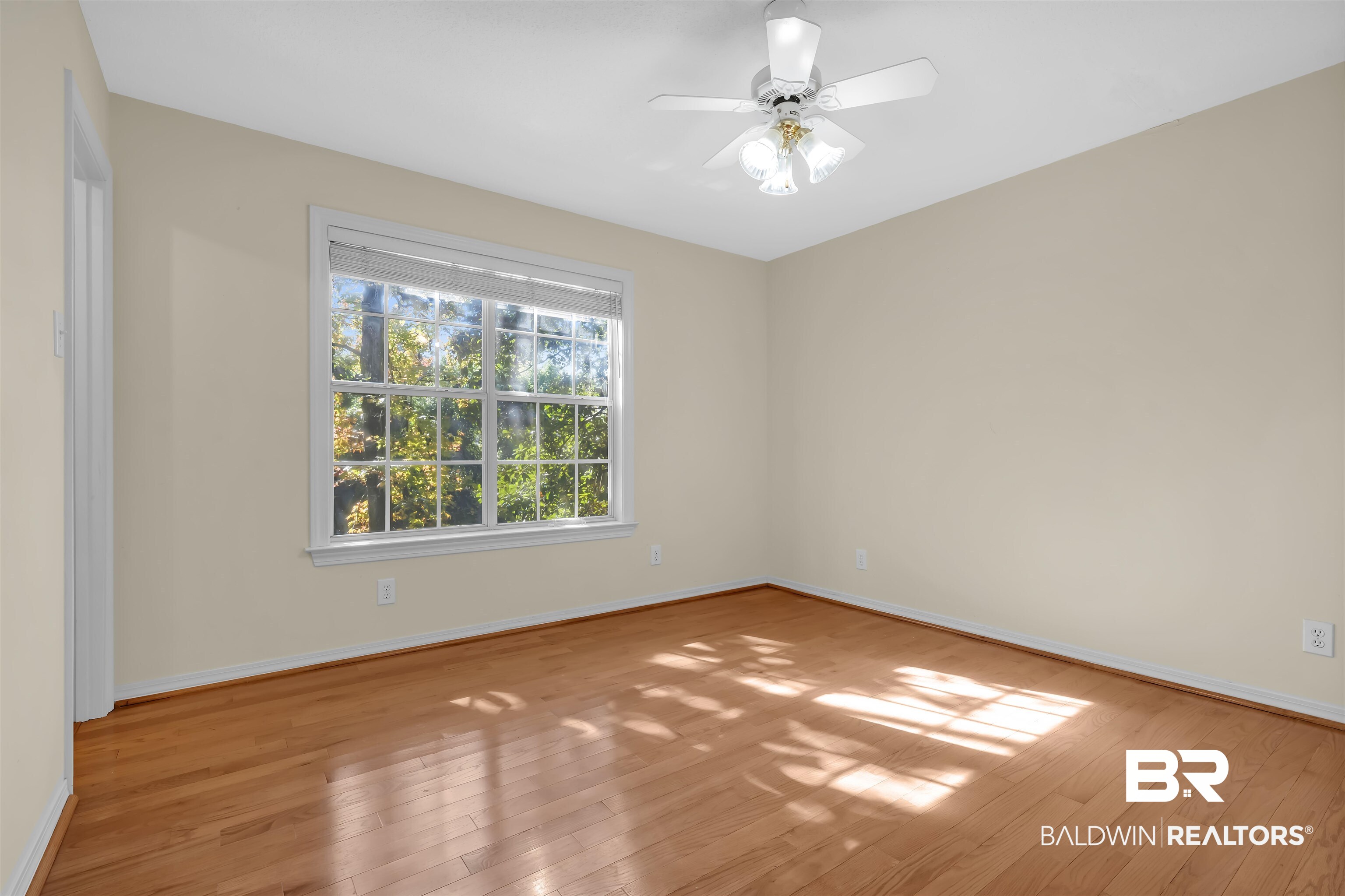 1262 Patrick Street Daphne, AL 36526 - Photo 20 of 35 Unfurnished room with light wood-style floors and ceiling fan