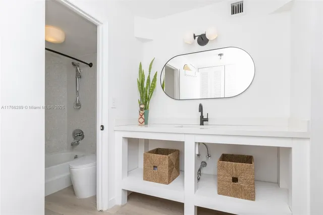 a room with a chair and a window