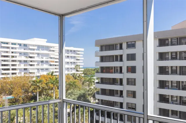 a kitchen with a table and chairs in it