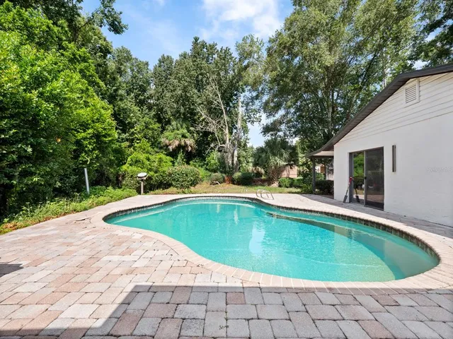 a view of outdoor space and swimming pool