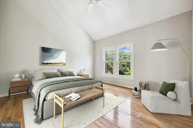 a bedroom with a bed and a couch