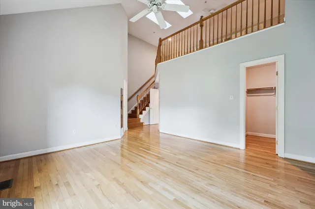 a view of an entryway with wooden floor