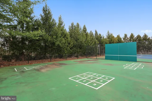a building with cars parked in front of it