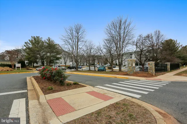 a view of a building with a couple of people