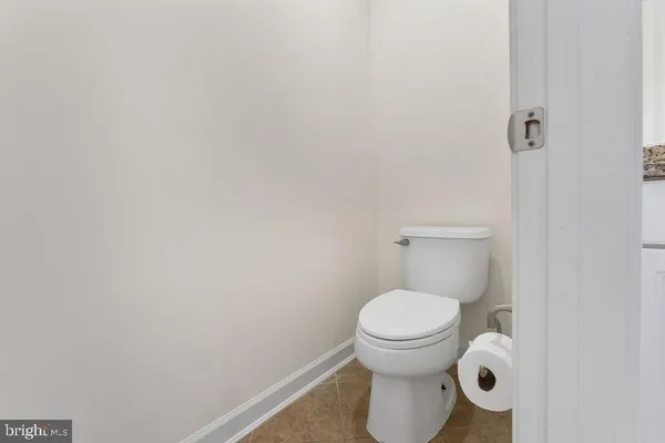 a bathroom with a toilet and a sink