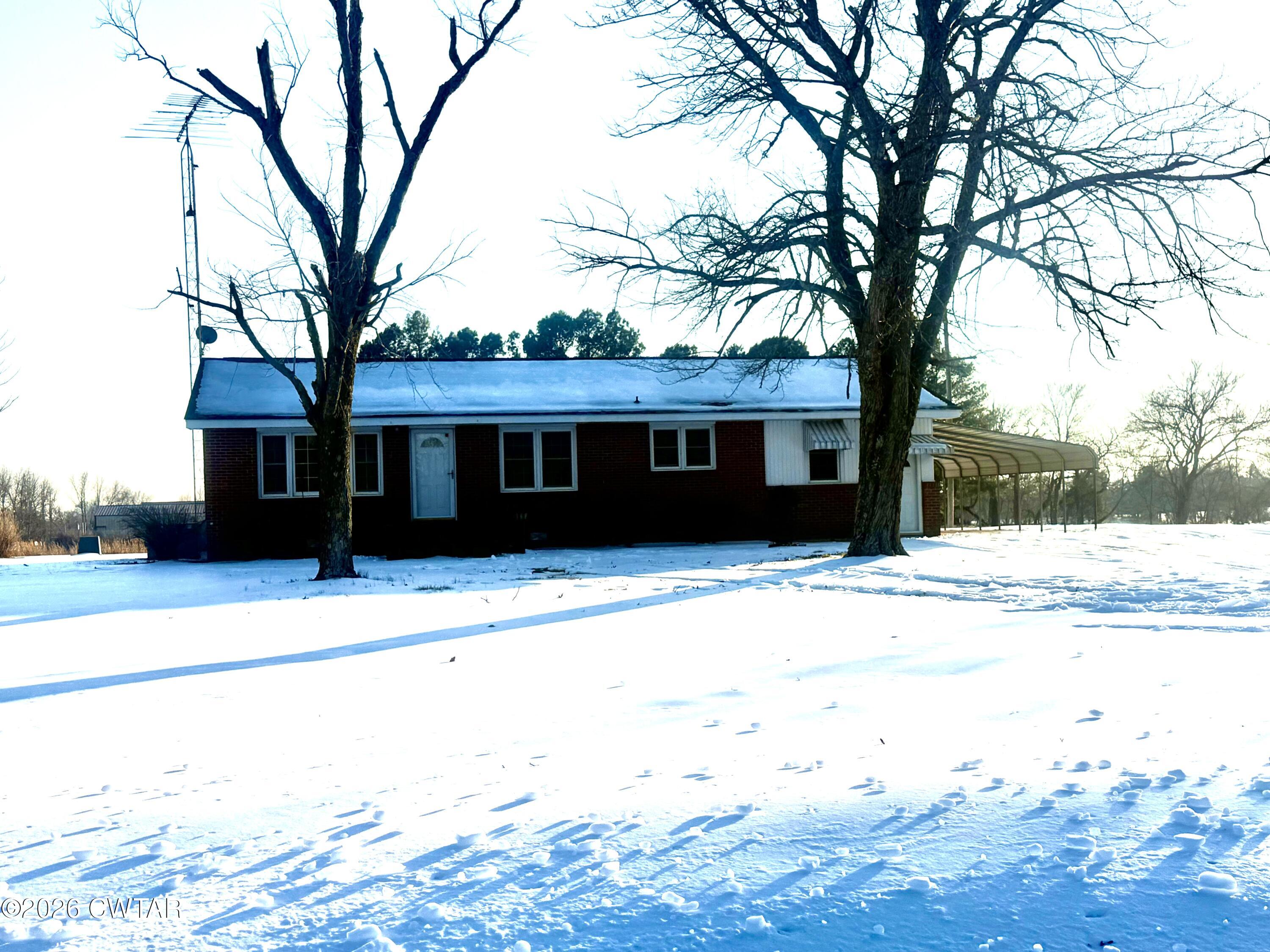 5389 Rives Mt Pelia Road Rives, TN 38253 - Photo 3 of 19 a front view of a house with a yard