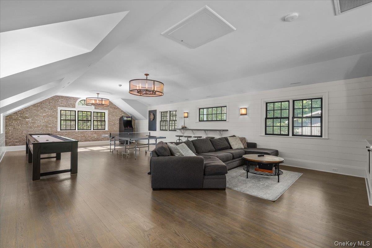 135 Pines Bridge Road Katonah, NY 10536 - Photo 15 of 40 a living room with furniture and a window