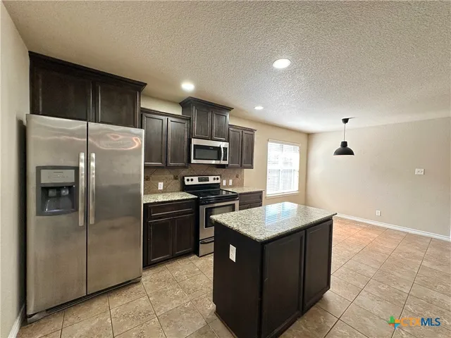 a storage room with wooden floor