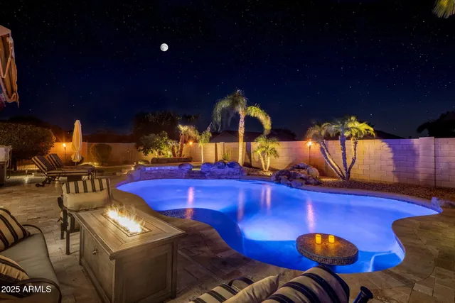 a view of a house with swimming pool