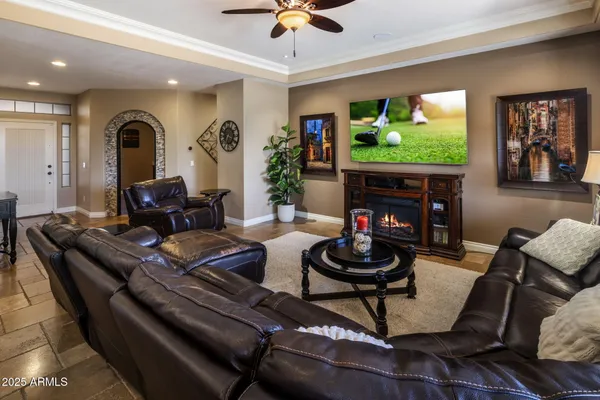 a kitchen with a table chairs refrigerator and sink