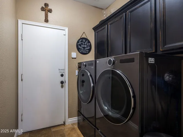 a living room with furniture and a swimming pool