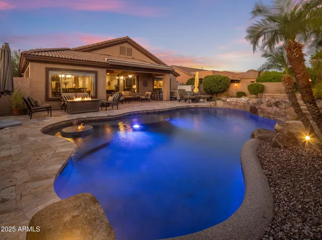 a view of a lake with a sitting area