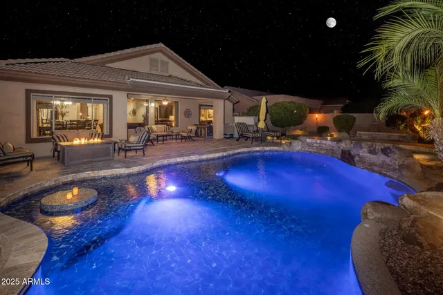 a view of a garden with a building in the background