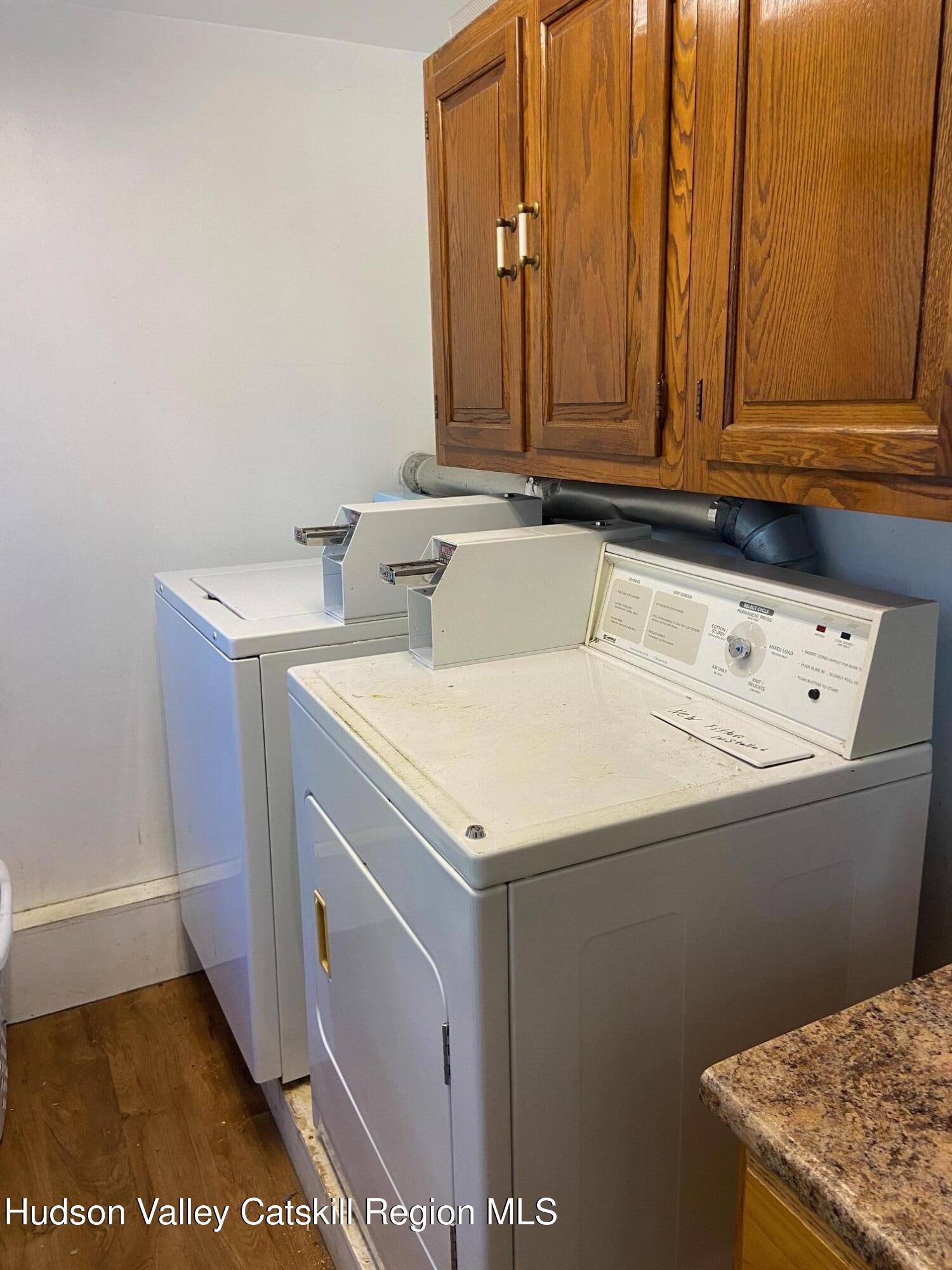 214 Robinson Street, Unit 2 Hudson, NY 12534 - Photo 13 of 13 a utility room with dryer and washer