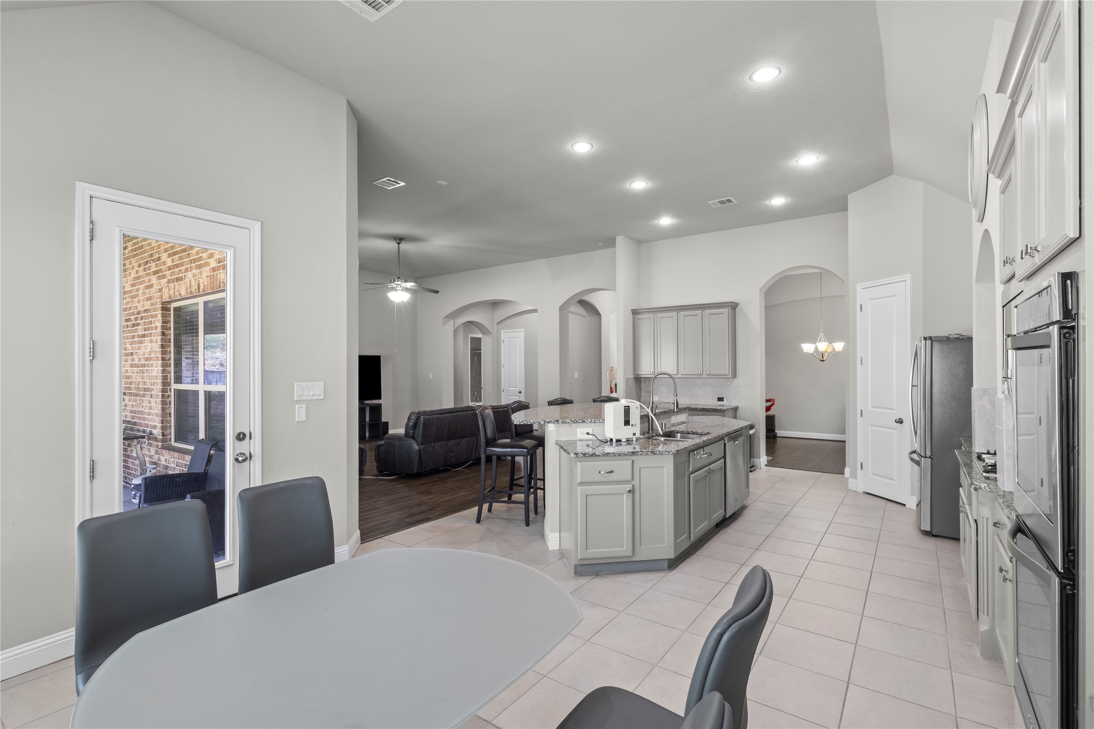 9935 Kirkstone Terrace Drive Spring, TX 77379 - Photo 11 of 49 Door to large covered patio and breakfast nook