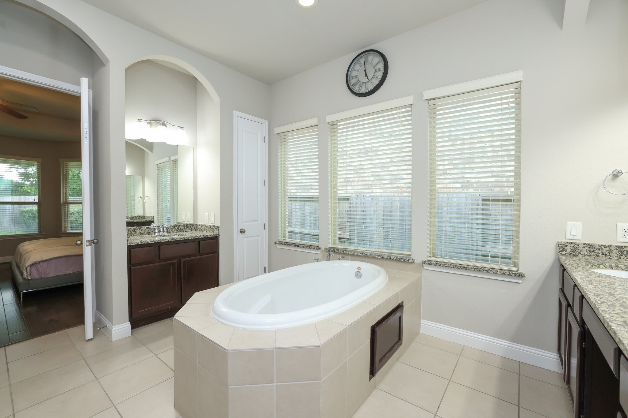 9935 Kirkstone Terrace Drive Spring, TX 77379 - Photo 33 of 49 Convenient cabinet door below tub for ease in getting to plumbing