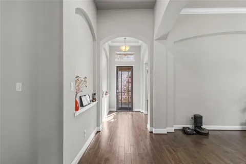 a kitchen with stainless steel appliances kitchen island granite countertop a sink and cabinets