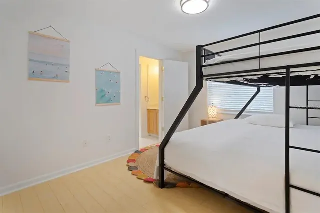 a view of an empty room with stairs