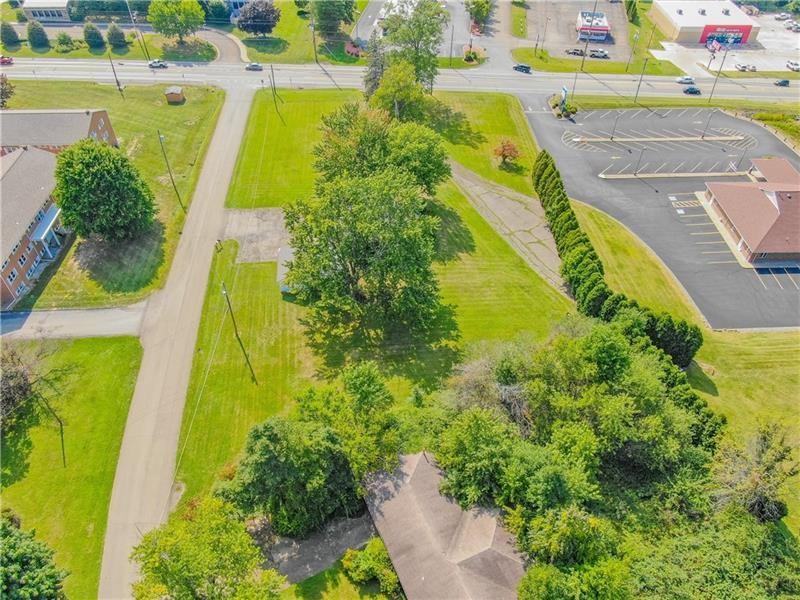 2516 Wilmington Road New Castle, PA 16105 - Photo 6 of 10 a view of an swimming pool with a yard