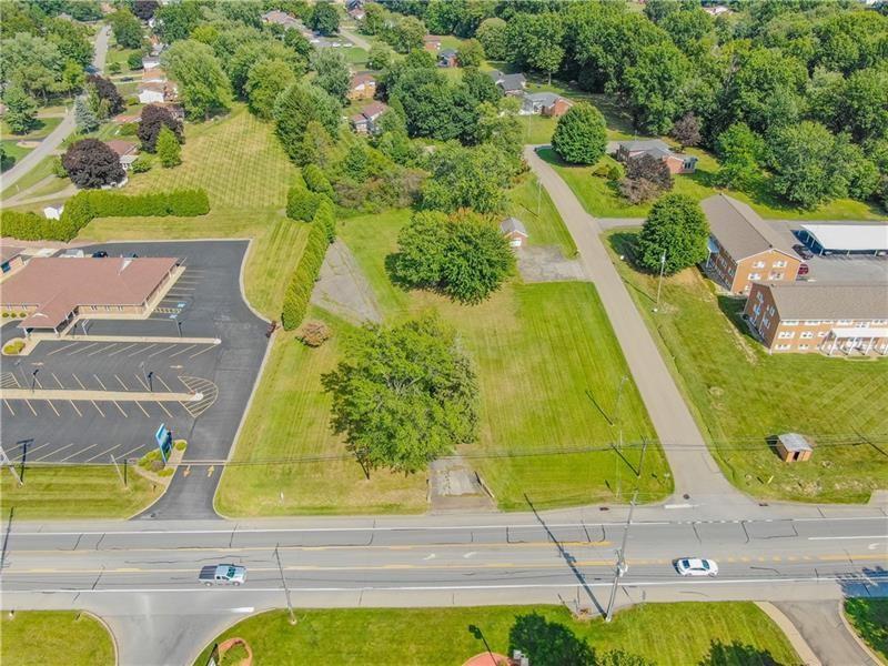 2516 Wilmington Road New Castle, PA 16105 - Photo 8 of 10 an aerial view of a swimming pool with outdoor seating