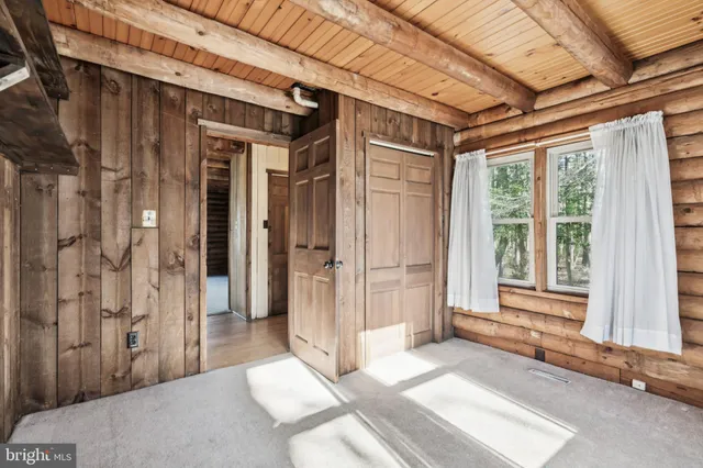 a view of a room with a large window