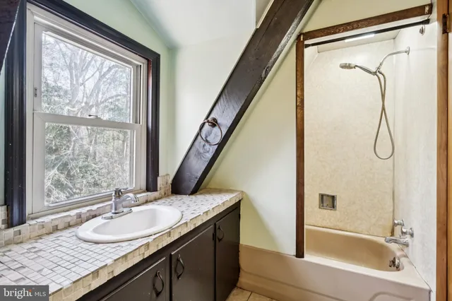 a view of backyard with swimming pool and outdoor space