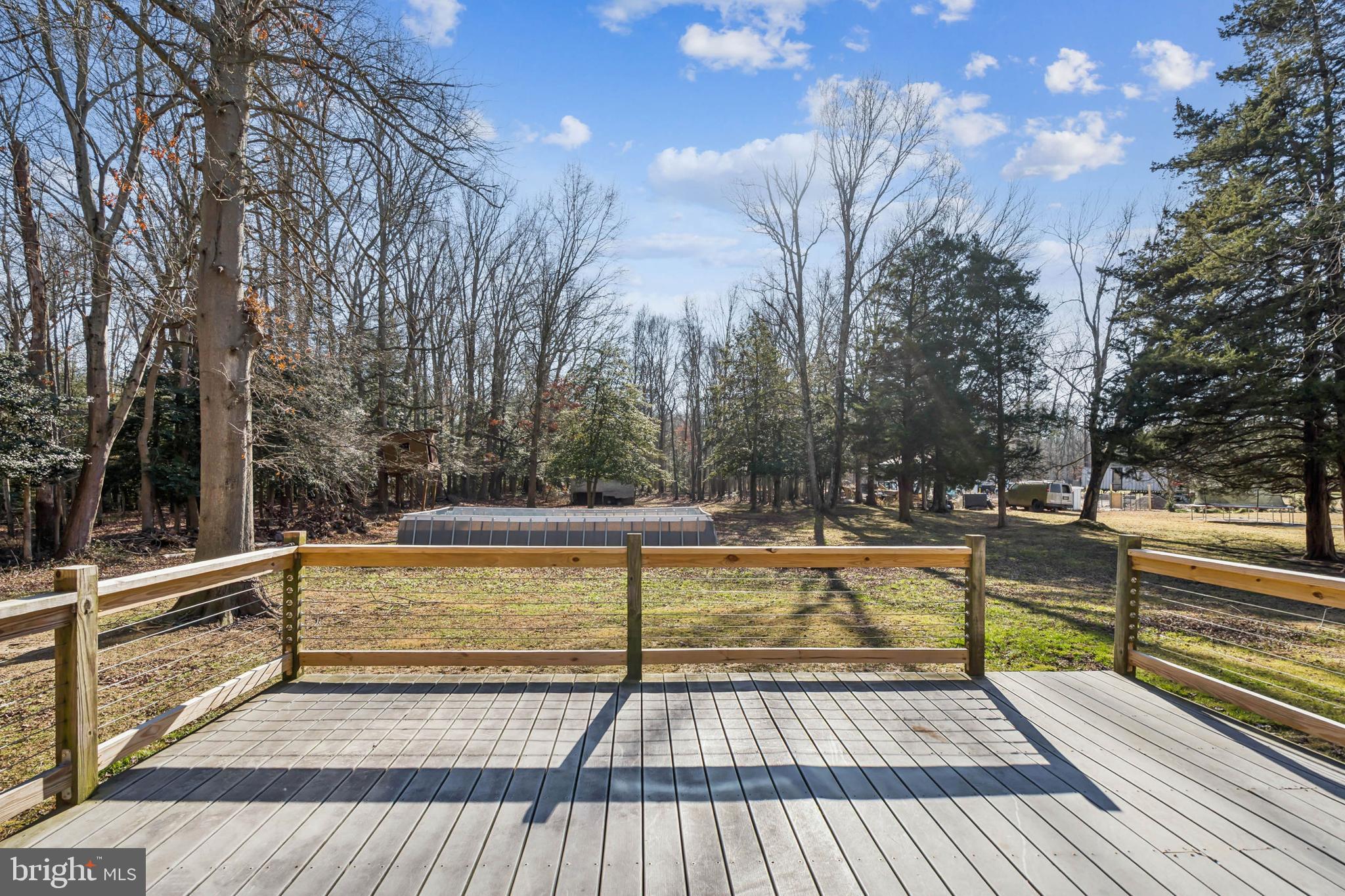 85 Quinton Alloway Road Salem, NJ 08079 - Photo 22 of 24 Backyard deck looking out over >2 acres!