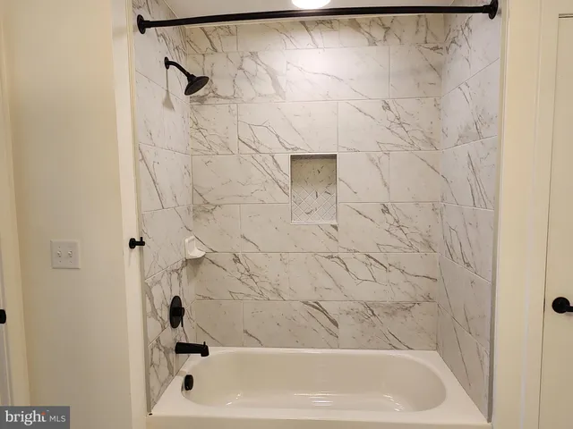 a bathroom with a bathtub