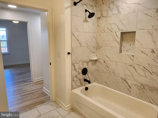 a bathroom with a bathtub