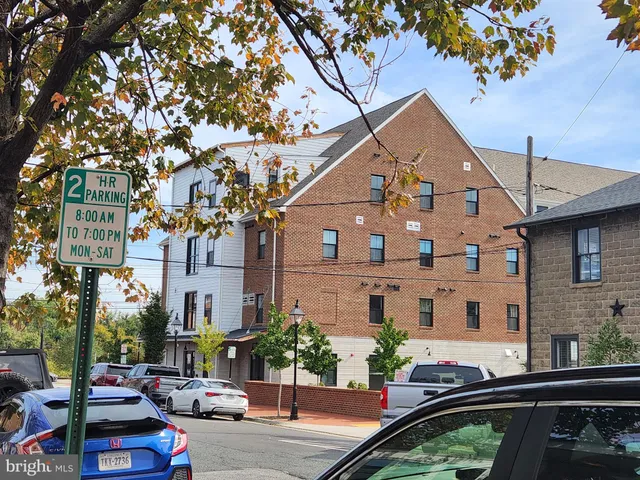 a view of parking garage with cars