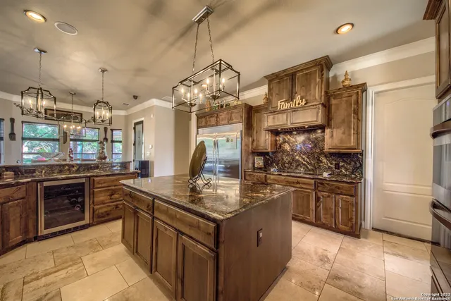a outdoor living space with lots of furniture and a rug