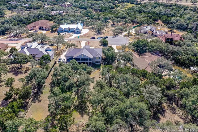 a view of entryway and hall way with furniture