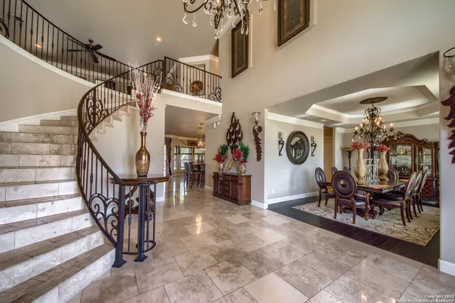 a view of a chairs and table in a patio