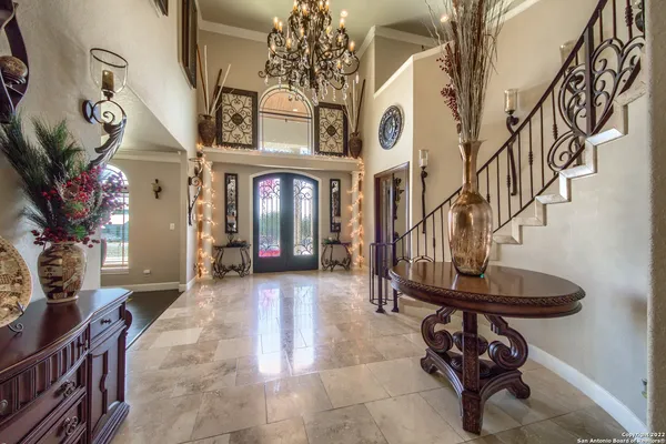 a lobby with furniture and window
