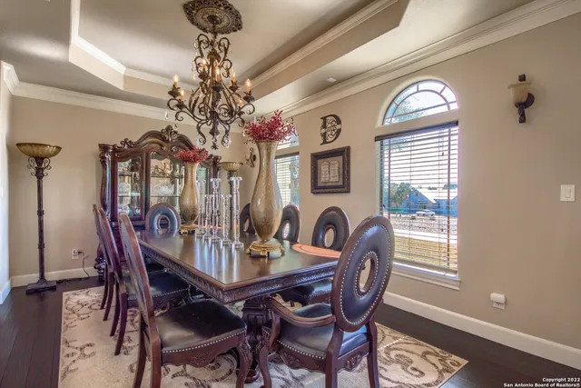 a living room with fireplace furniture and a flat screen tv