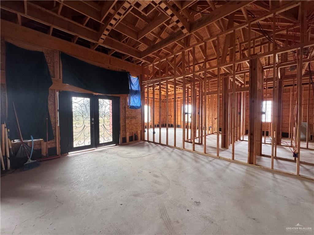 23611 Goldwing Way Edcouch, TX 78538 - Photo 20 of 25 Miscellaneous room with french doors and unfinished concrete floors
