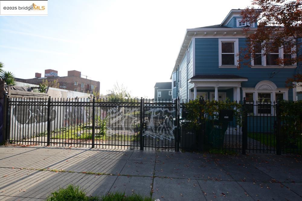 1633 8th Street Oakland, CA 94607 - Photo 18 of 56 a view of a house with a roof deck