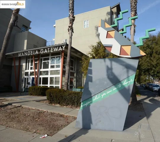 a view of a city from a corridor