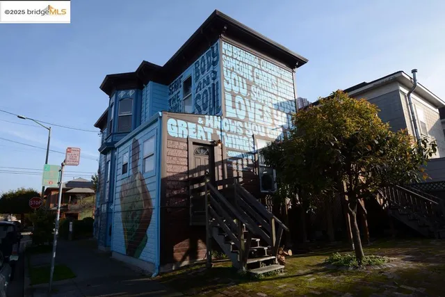 front view of a house with a tree