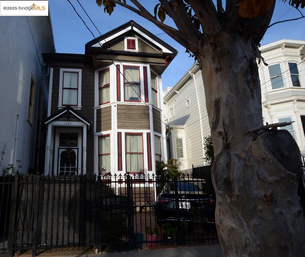 1633 8th Street Oakland, CA 94607 - Photo 47 of 56 a front view of a house with glass windows