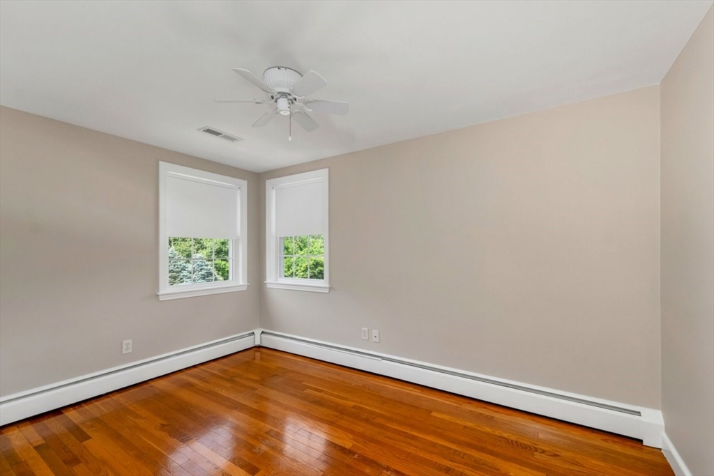 252 Littlefield Road Boxborough, MA 01719 - Photo 19 of 40 an empty room with a window