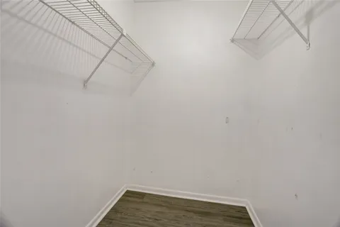 a view of a room with racks on the wall