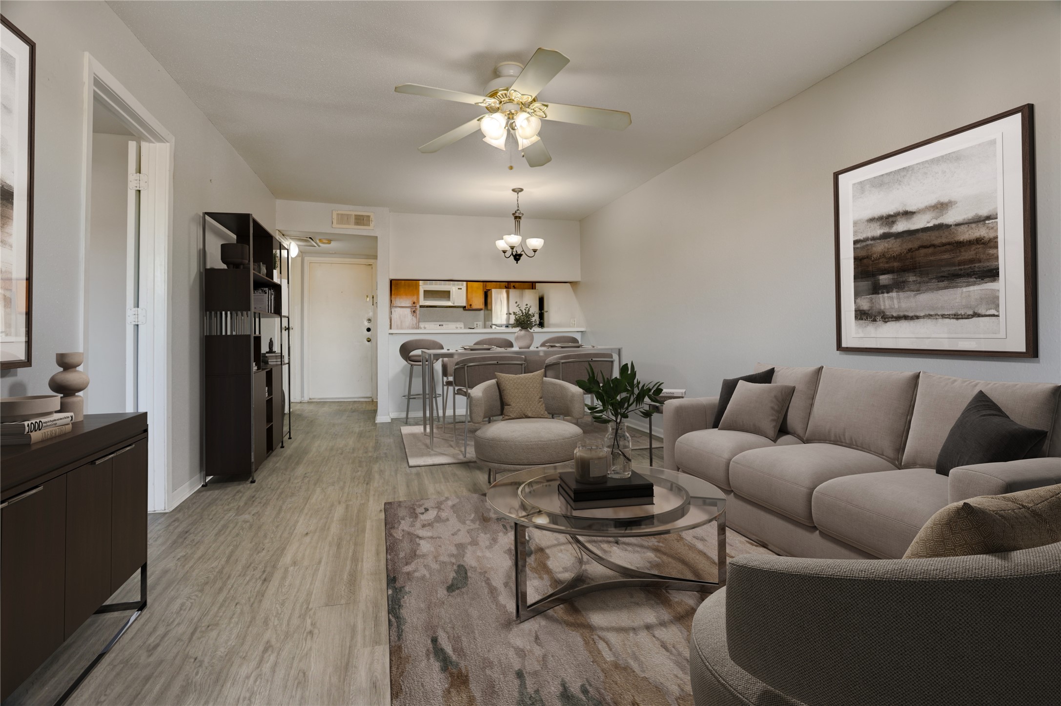 3015 Walnut Bend Lane, Unit 35 Houston, TX 77042 - Photo 3 of 15 a living room with furniture and a chandelier