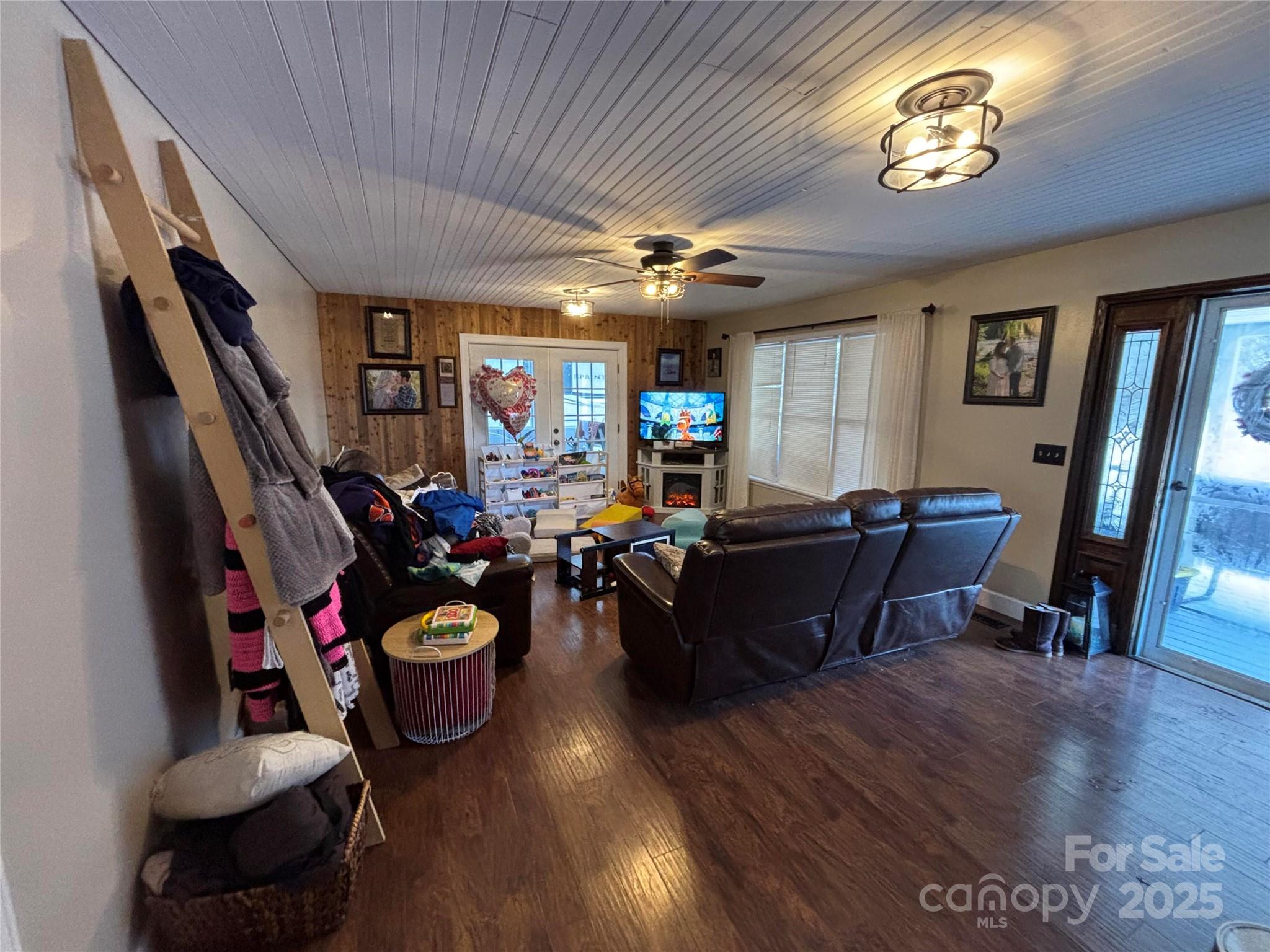 119 Squirrel Ridge Canton, NC 28716 - Photo 8 of 12 a living room with furniture and a wooden floor